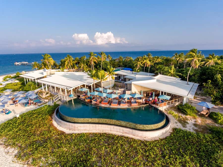 Fiji: Malamala Beach Club Private Island Day Pass & Transfer - Snorkeling and water time: included gear, coral shoes, and low-tide reality