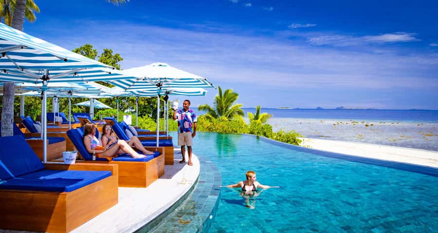 Fiji: Malamala Beach Club Private Island Day Pass & Transfer - On-island time: white sand, infinity-edge pool, and shade options